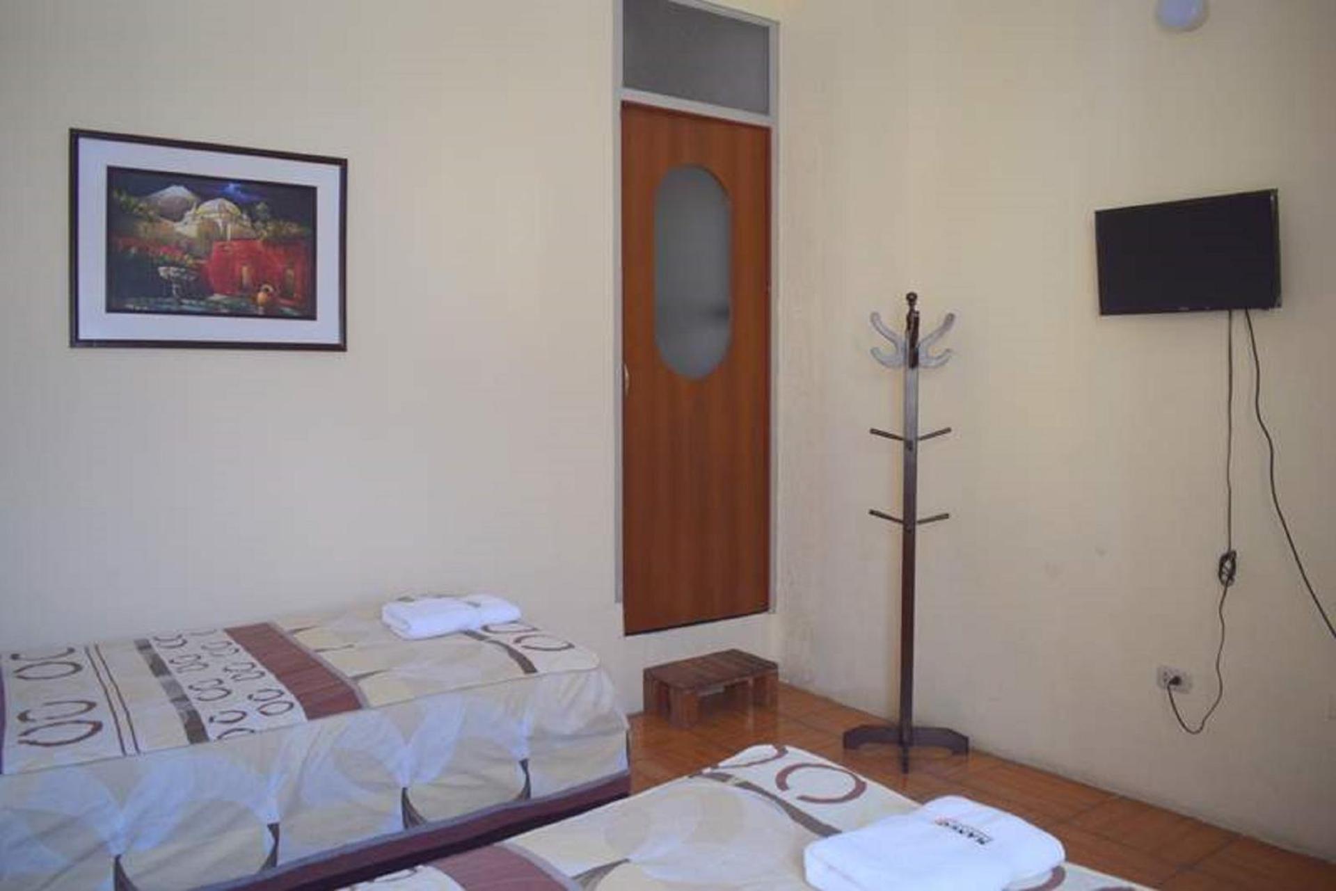 Habitación Doble con baño privado - 2 camas